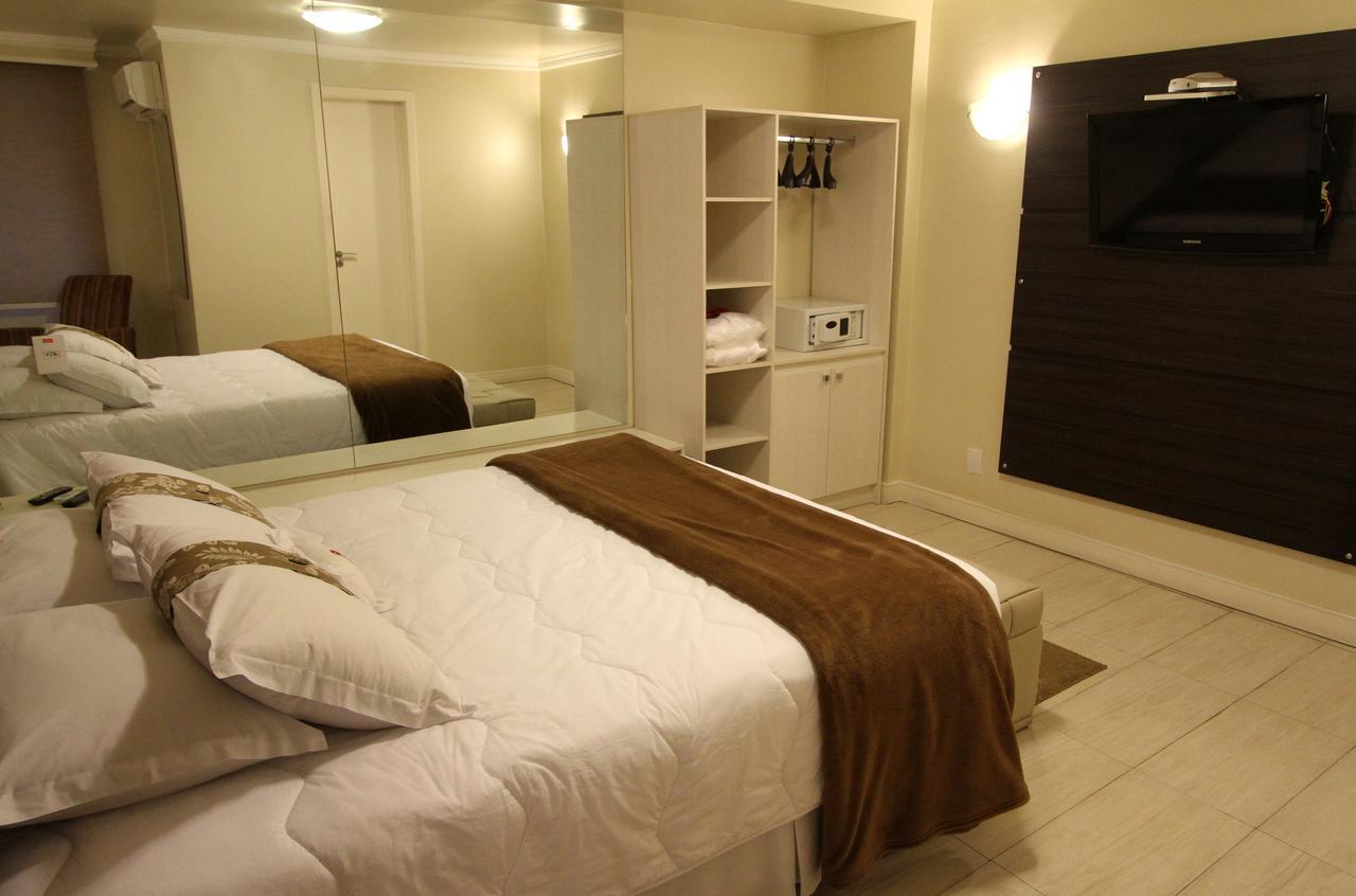 Hotel Curi Executive بيلوتاس المظهر الخارجي الصورة